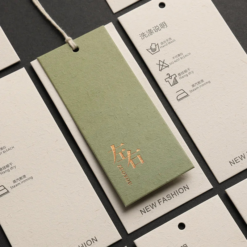 2024 New Design Custom Printing Logo Luxury High Quality Green Paper Set Cloth Custom Clothing Hang Tag Label Tag Card